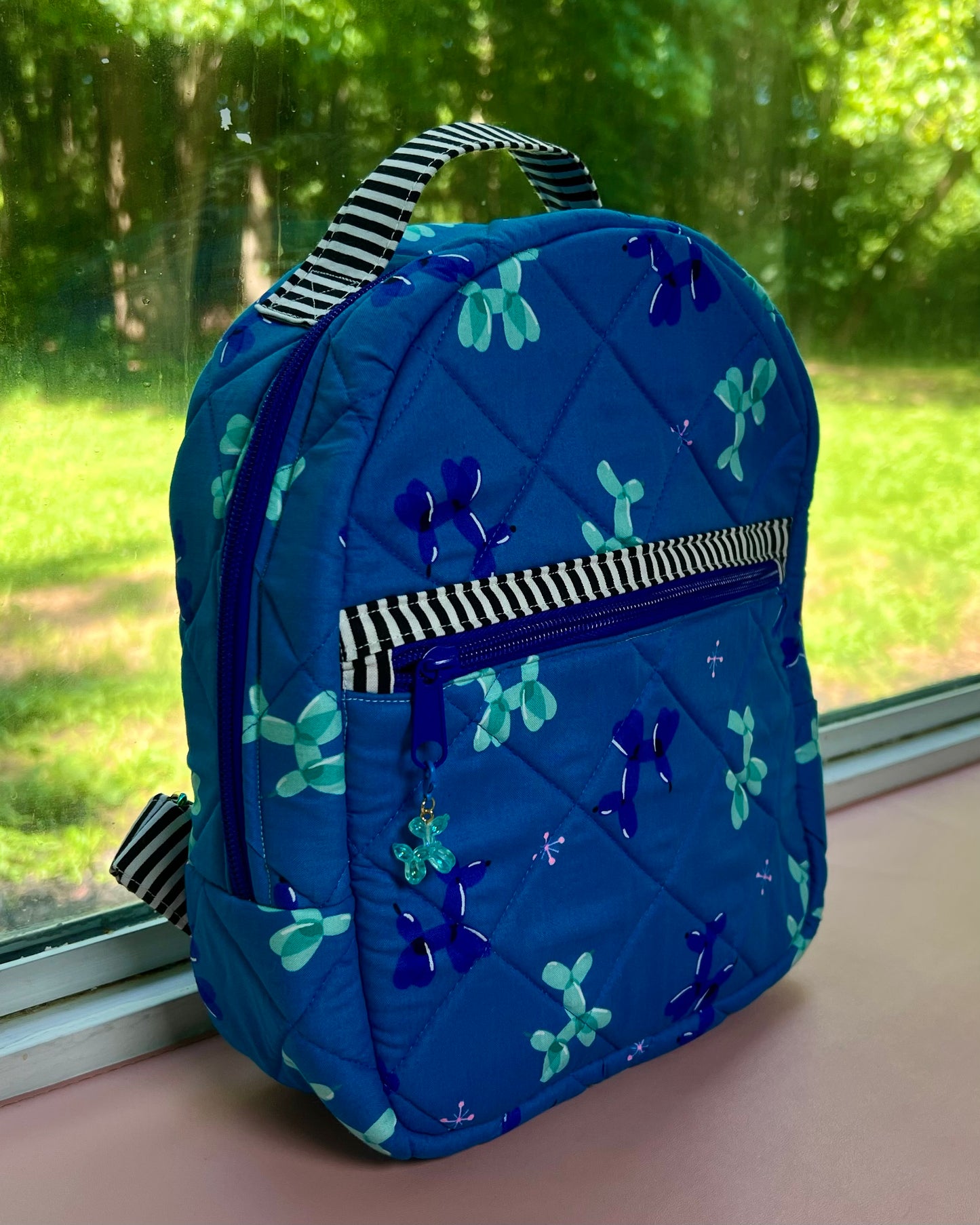 The Carnival Pup Backpack