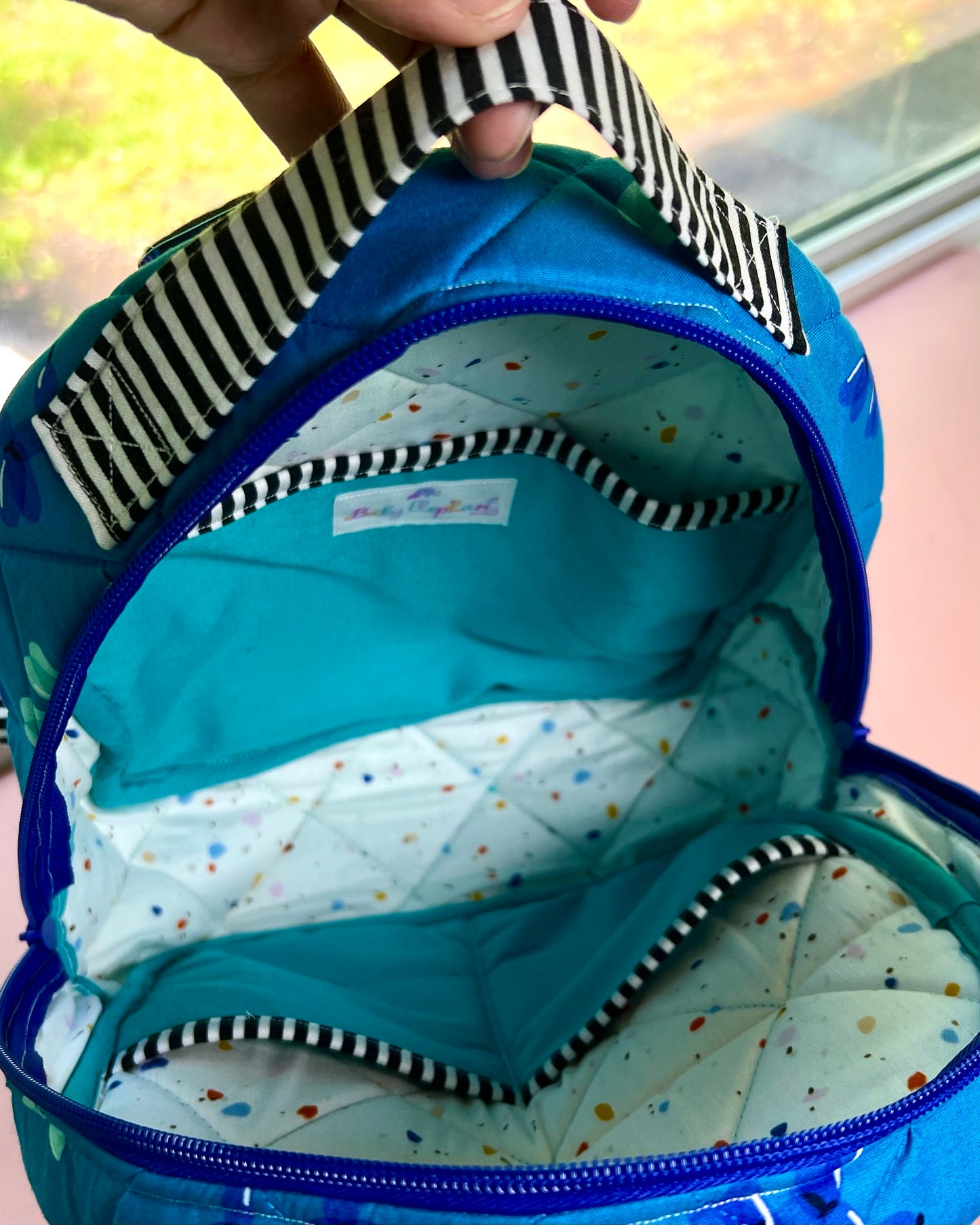 The Carnival Pup Backpack